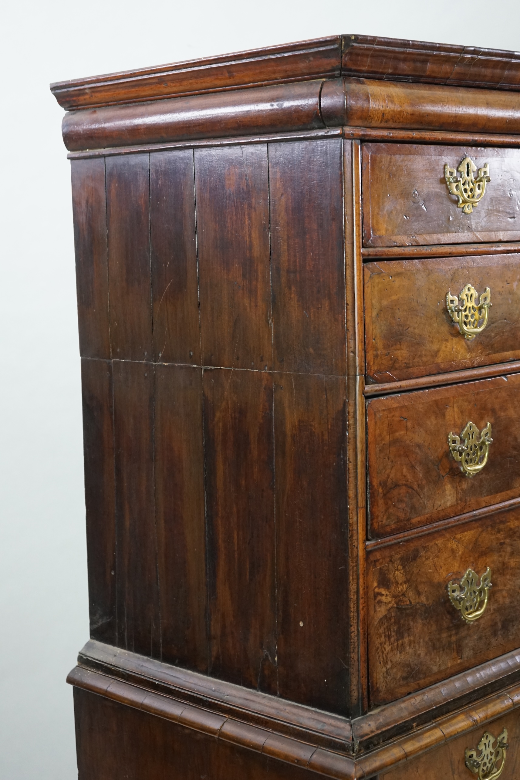 An early 18th century walnut chest on stand